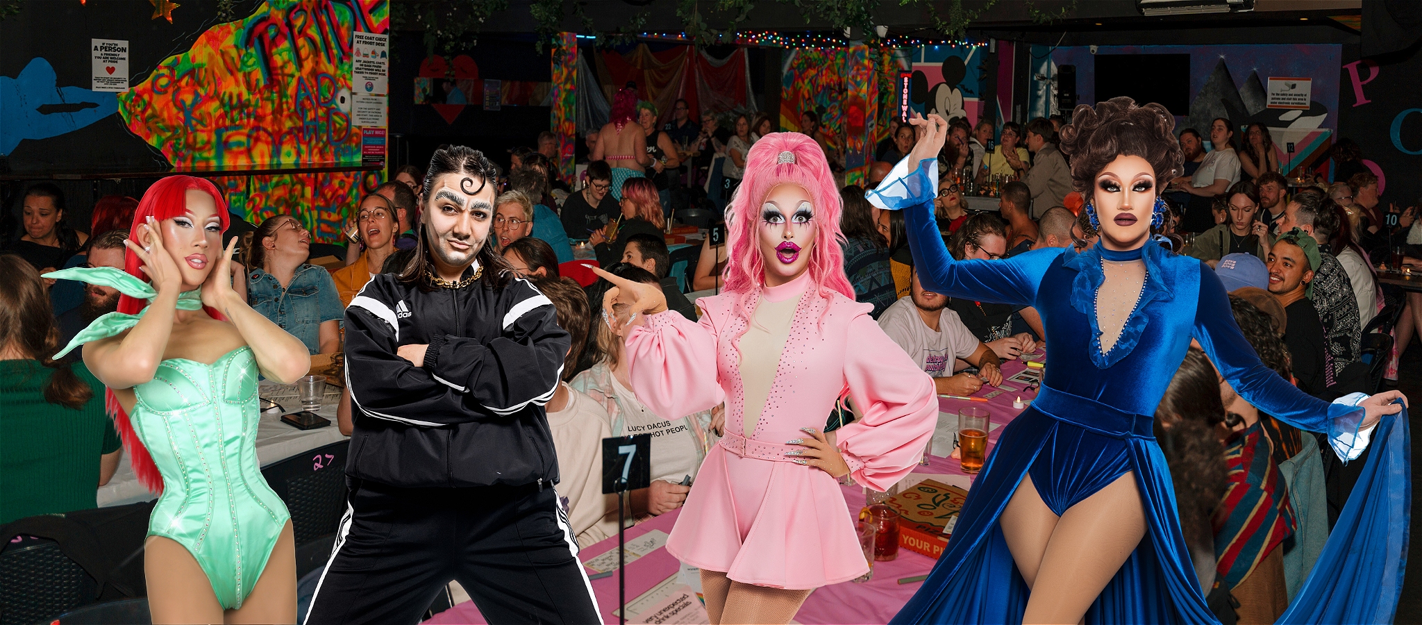 Three drag queens and a drag king stand together, superimposed over a background photograph of a crowded room playing bingo.