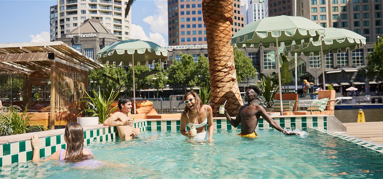 A group enjoying Alfoat's swimming pool