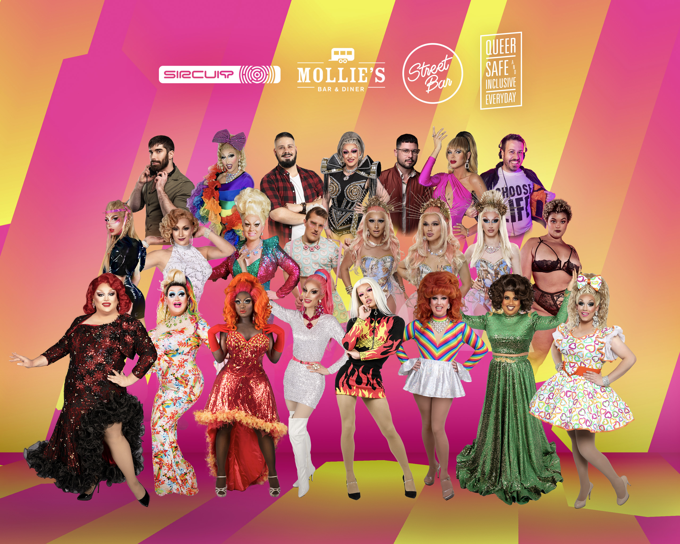 Large crowd of lavishly dressed drag queens and performers, arranged like a choir