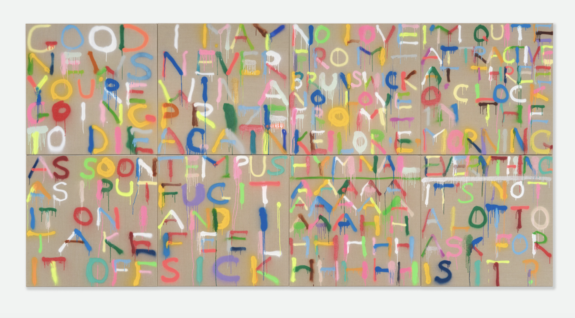 Lots of letters of the alphabet in front of a brown background