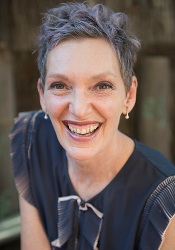 Headshot of Philipa smiling broadly