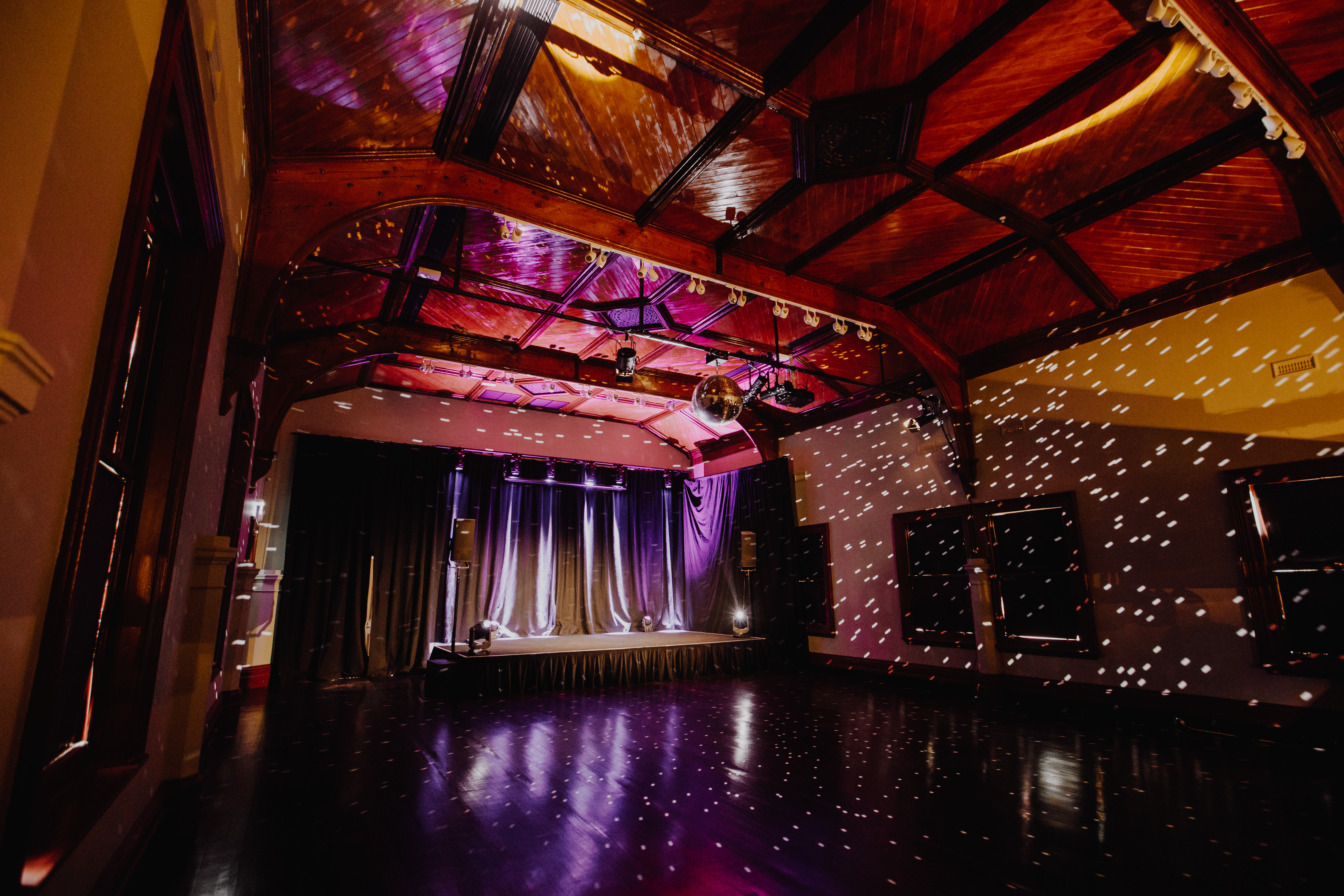 Interior of the main Fringe performance space, devoid of audience, but with lighting active