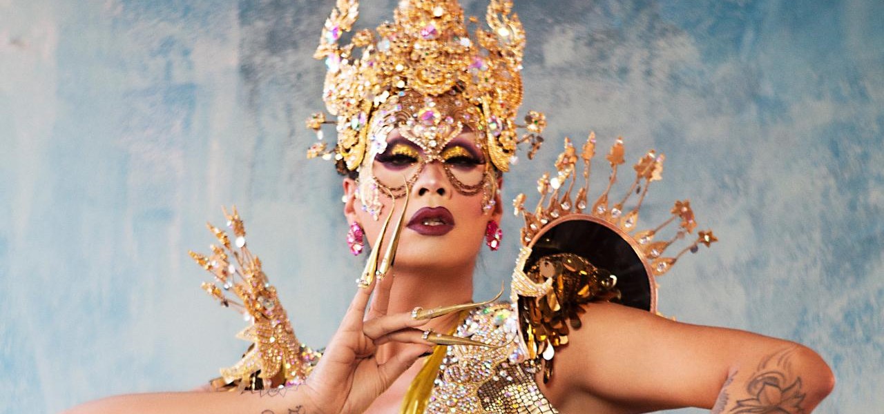 Person dressed in glamorous traditional Thai gold dress - from the NGV TEENS: QUEER HORIZONS — CURATOR TOUR