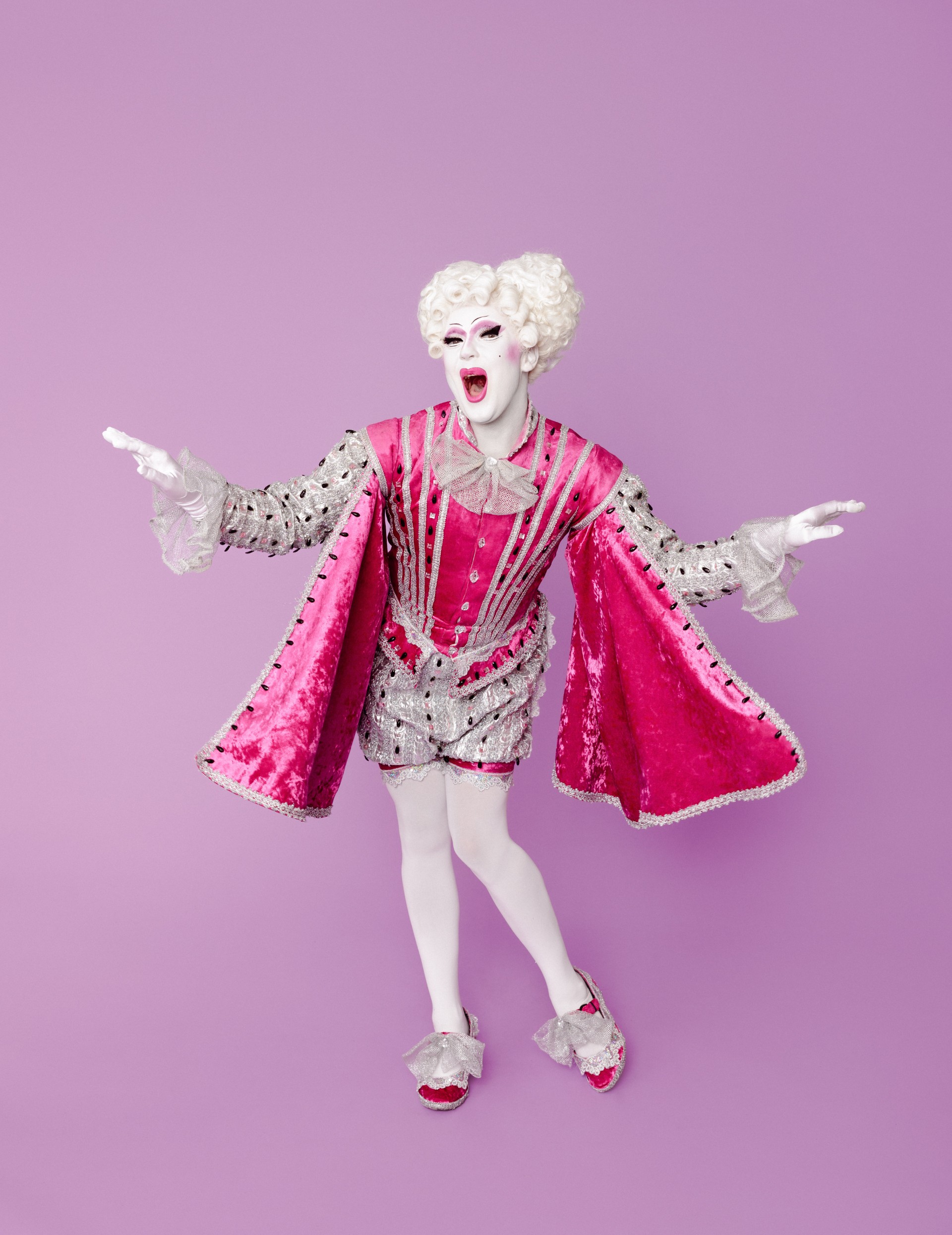Adore Handel dressed in a flamboyant regal outfit from a couple of centuries ago