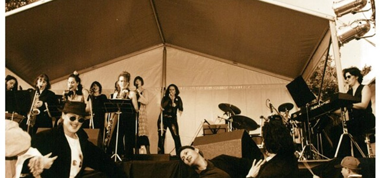 Midsumma Carnival 1996 by Richard Israel and 1997 by Virginia Selleck: performers on stage with people dancing in the audience