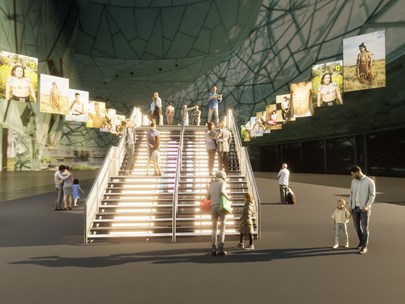 A bridge built within the Atrium at Fed Square featuring multiplee large digital artworks suspended on each side.