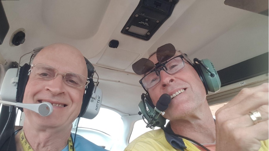 Alan and Roger in a Cessna cockpit - Alan at left, Roger (the pilot) at right
