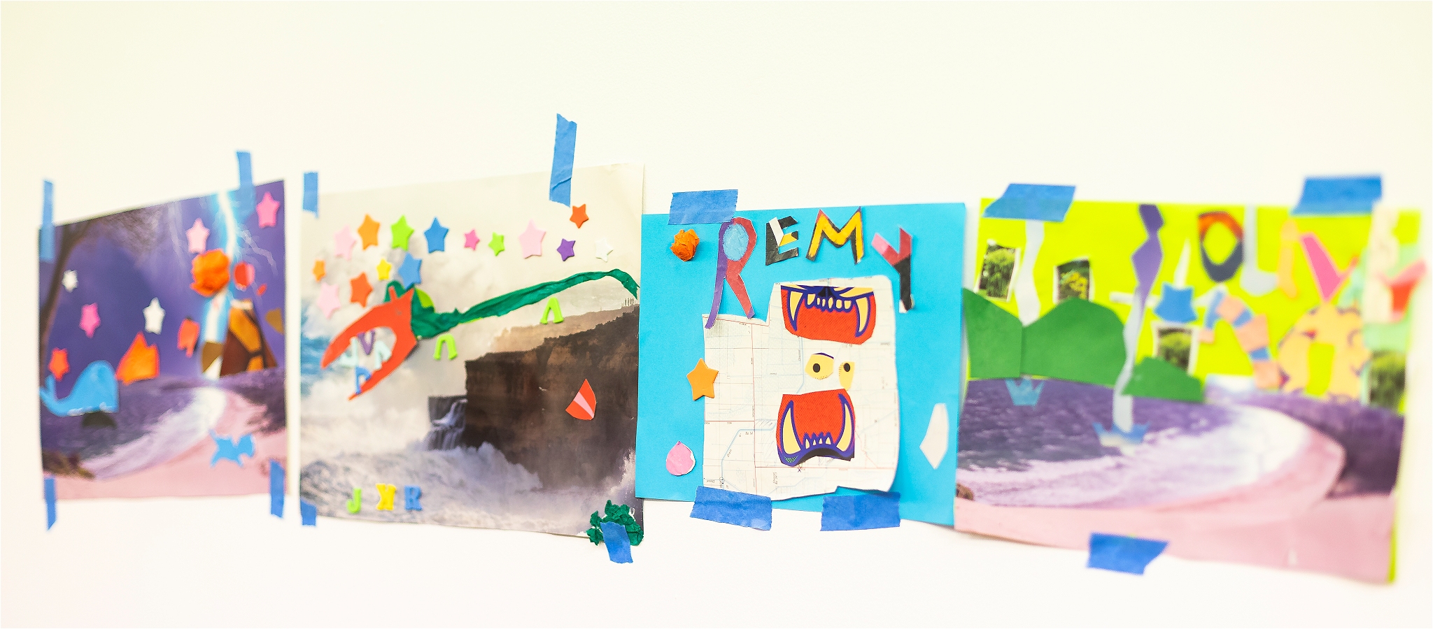 Various artworks of colourful collages displayed against a white wall
