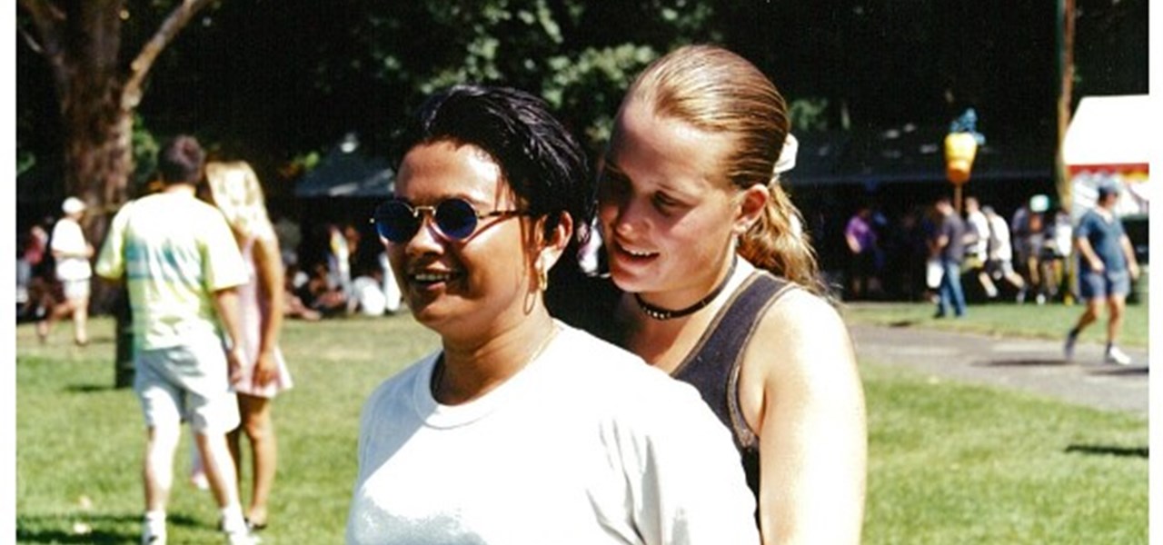 Midsumma Carnival 1996 by Richard Israel and 1997 by Virginia Selleck: two females, one behind the other, arms entwined