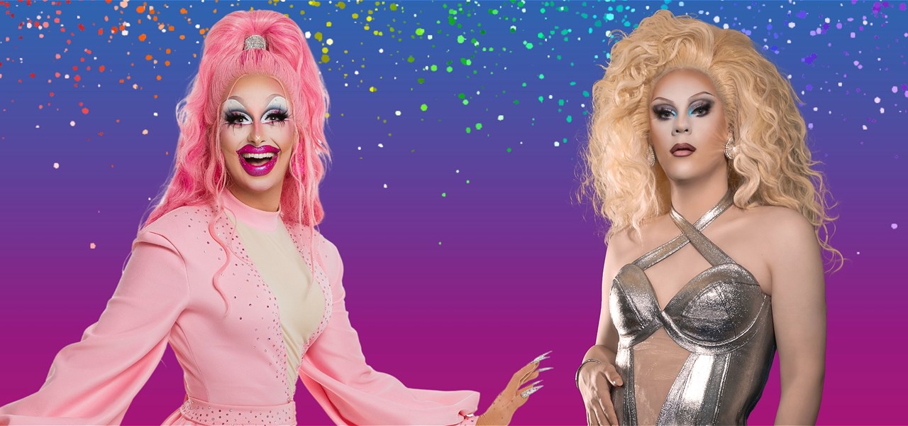 Two drag queens stand in front of a pink and purple background.