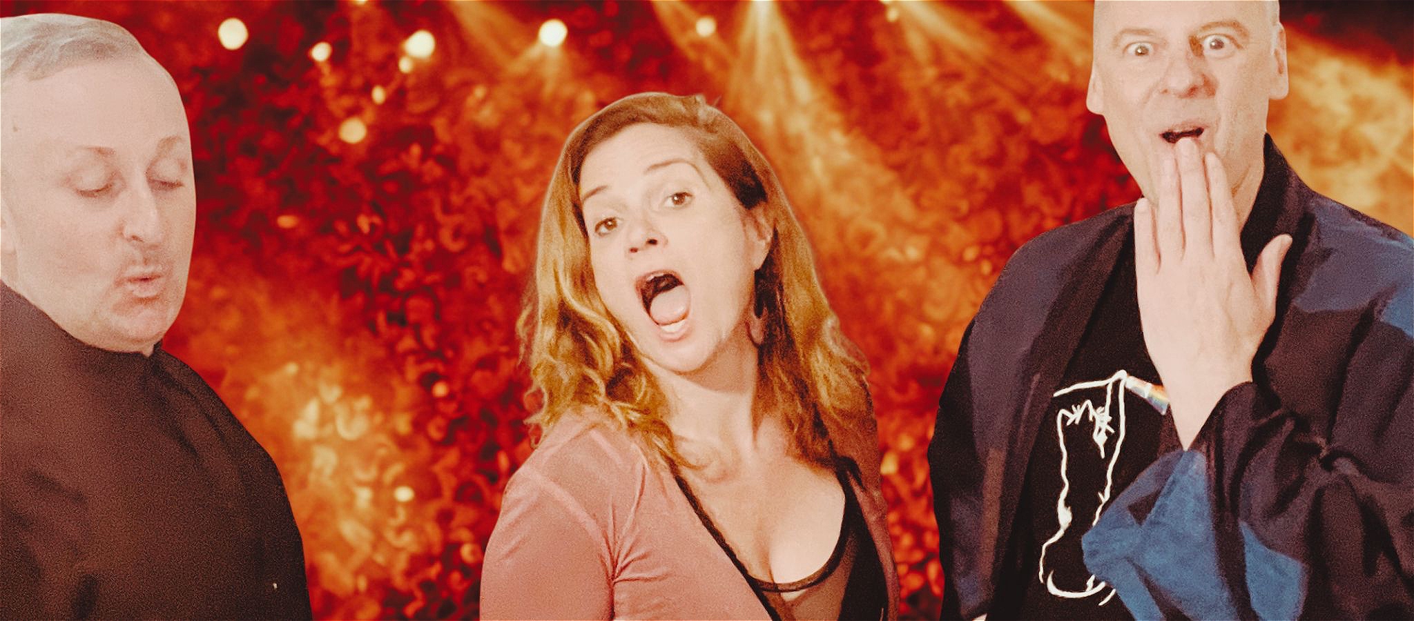Two men and a woman on stage in front of a red background, looking cheeky and surprised.