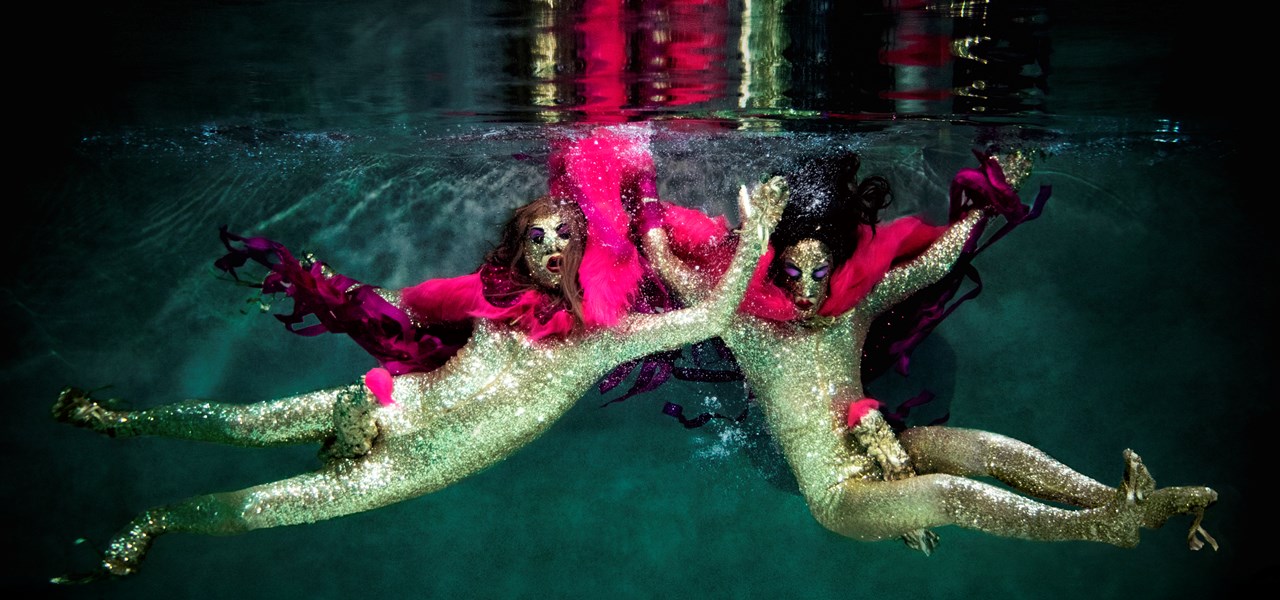 The Huxleys as mermen, underwater