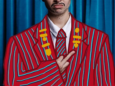 Person dressed in a red school blazer standing in front of a curtain. Head is truncated - only the mouth is visible.