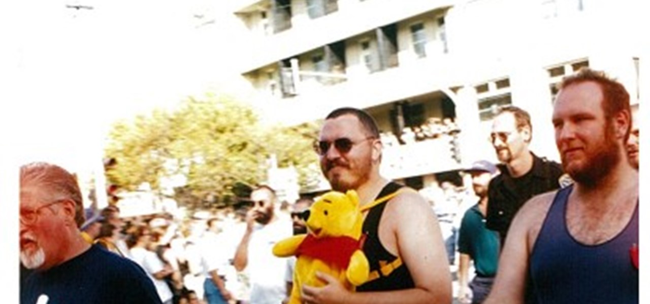 Pride March 2000 image: "bear-like men, one holding a teddy bear"