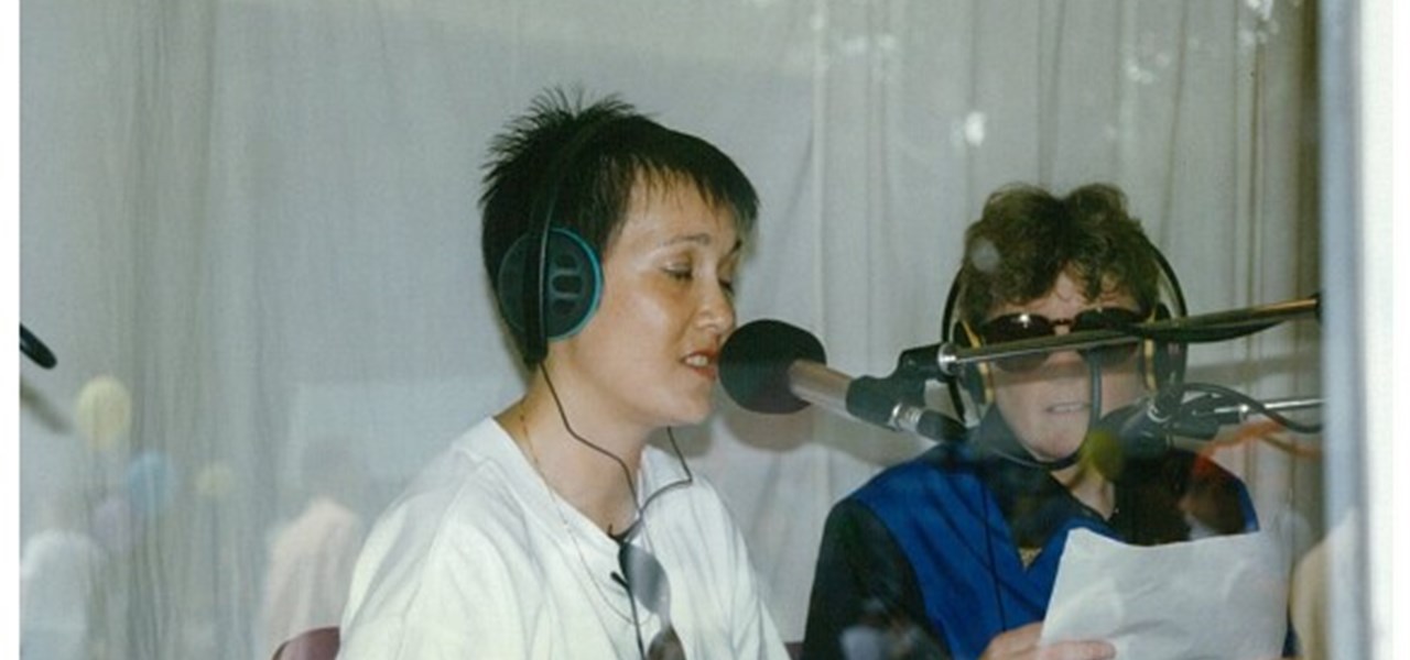 Midsumma Carnival 1996 by Richard Israel and 1997 by Virginia Selleck: singer wearing headphones; somebody (also with headphones) holding a sheet of paper is looking on