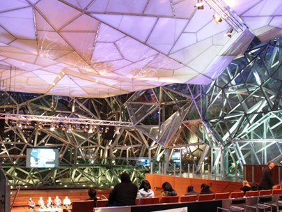 Interior of The Edge at Fed Square highlighting the roof and the stage