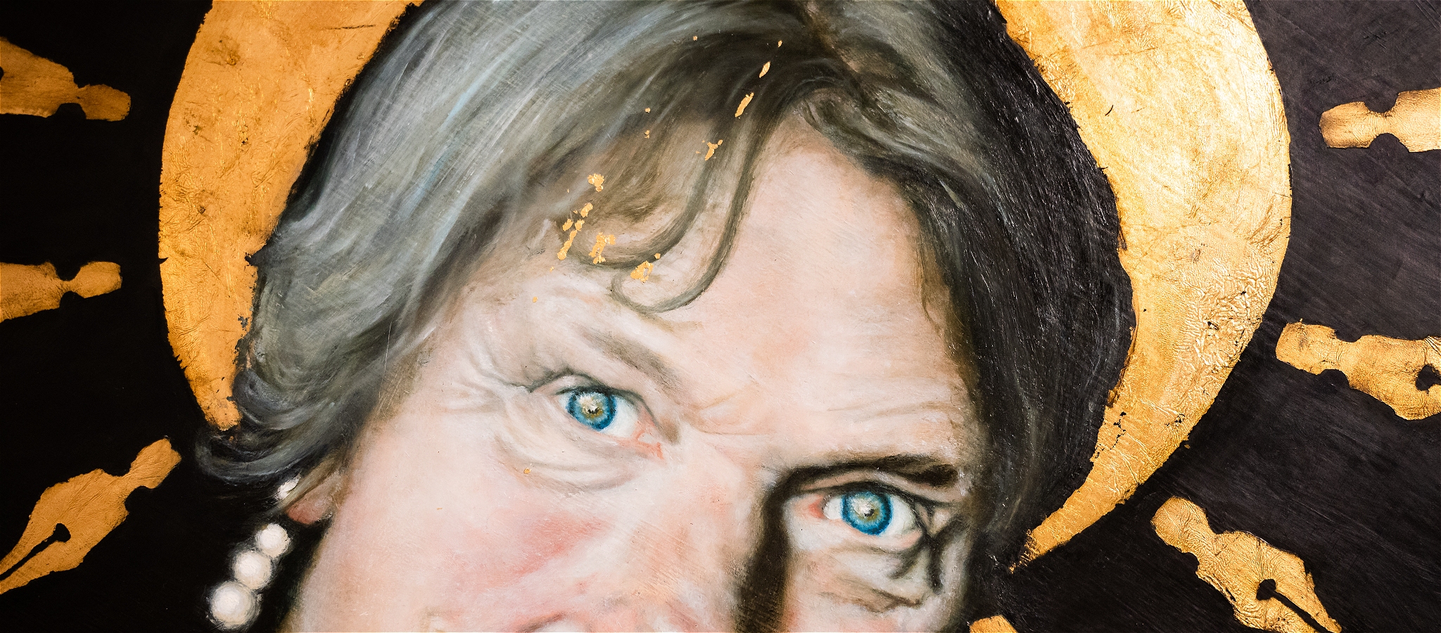 close up photograph of a painting of Jo Clifford wearing a gold crown