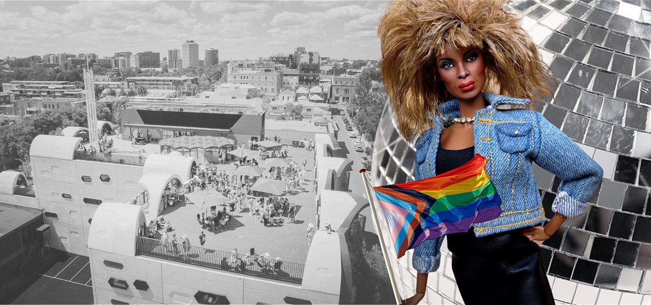 Doll of the singer Tina Turner holding a Pride flag in front of the Victorian Pride Centre roof and a giant mirrorball.