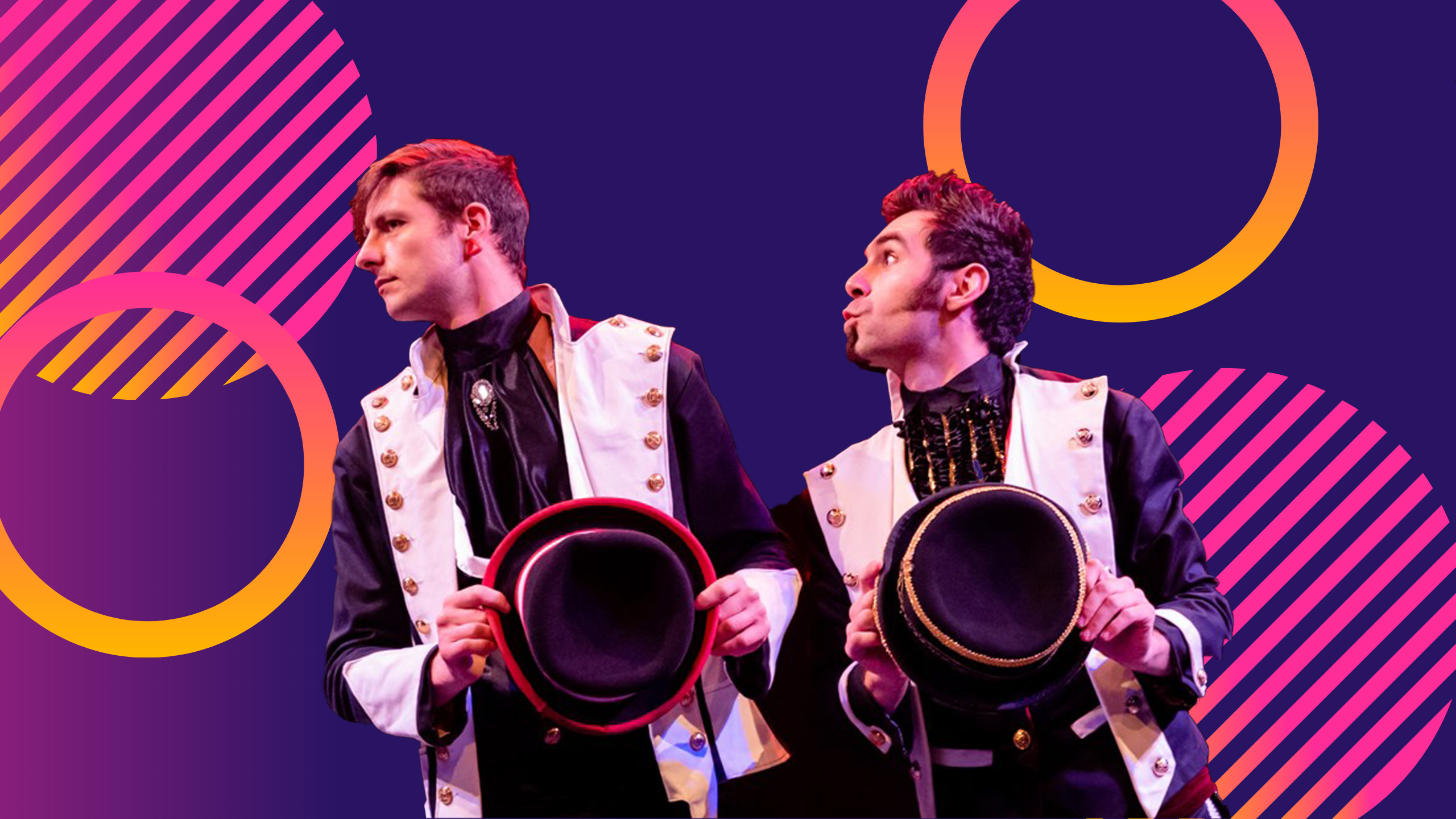 Two young men dressed stylishly holding top hats in front of them, looking sideways. One looks surprised.