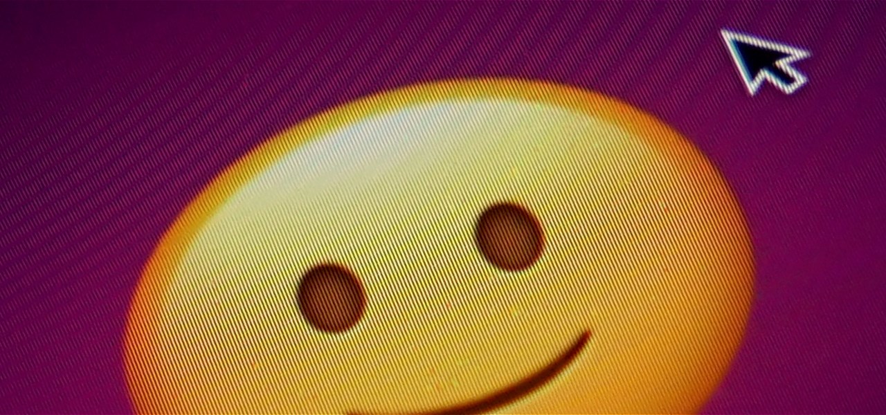 A smiley face icon and computer mouse cursor, pixelated on a screen with a purple and black background