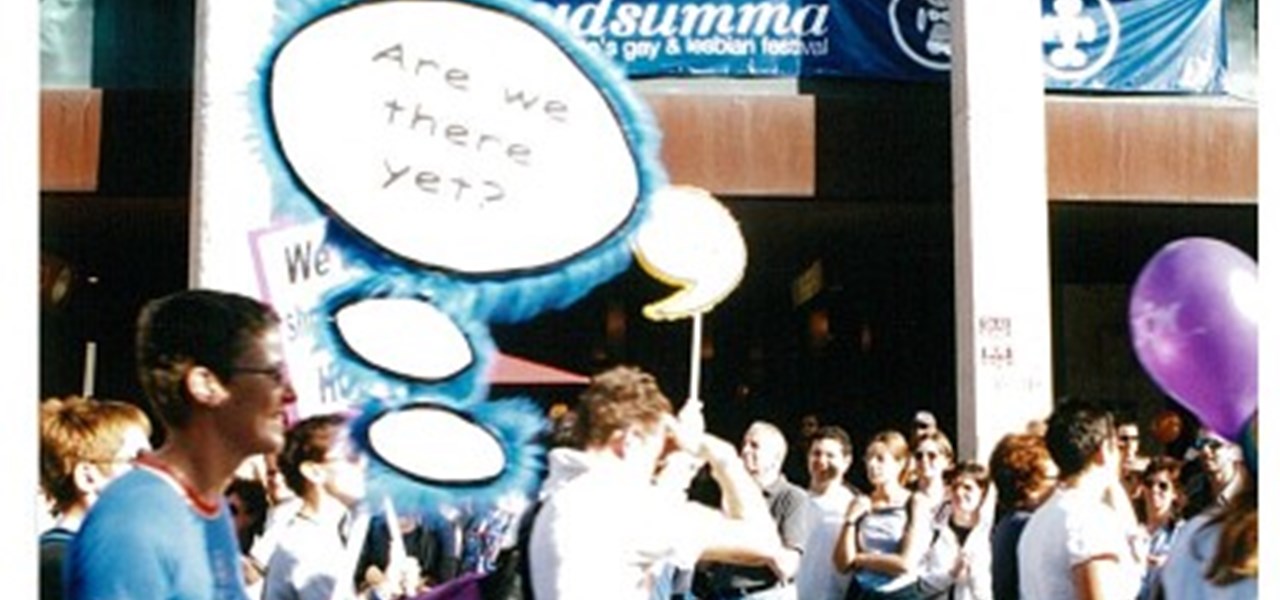 Pride March 2000 image: marchers holding a banner: "Are we there yet?"