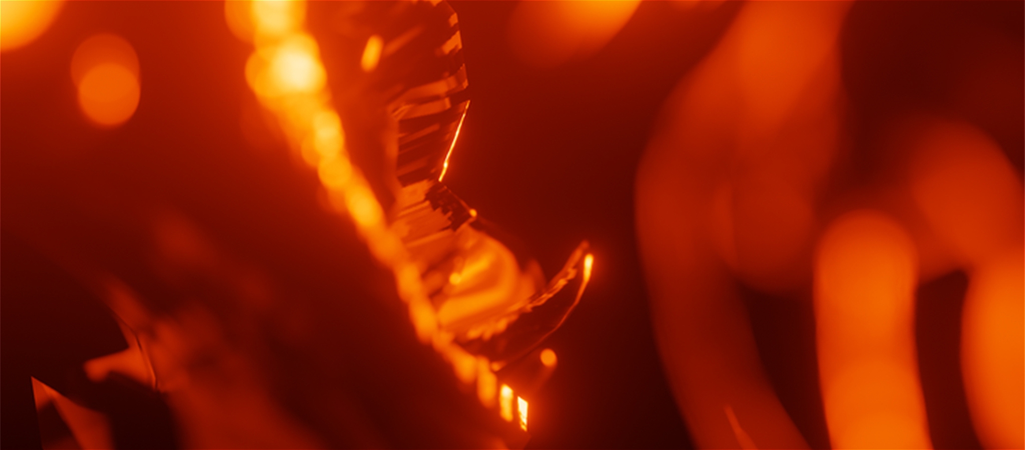 A video still of a 3D animation depicting an abstracted close-up of the tongue of a Malayan tiger-human hybrid and fangs in firey colours