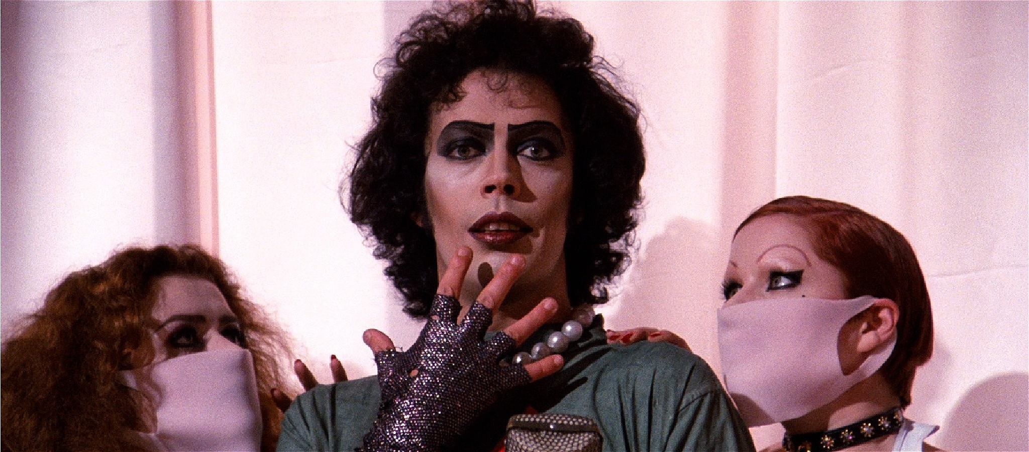 3 people with makeup on from the Rocky Horror Picture Show