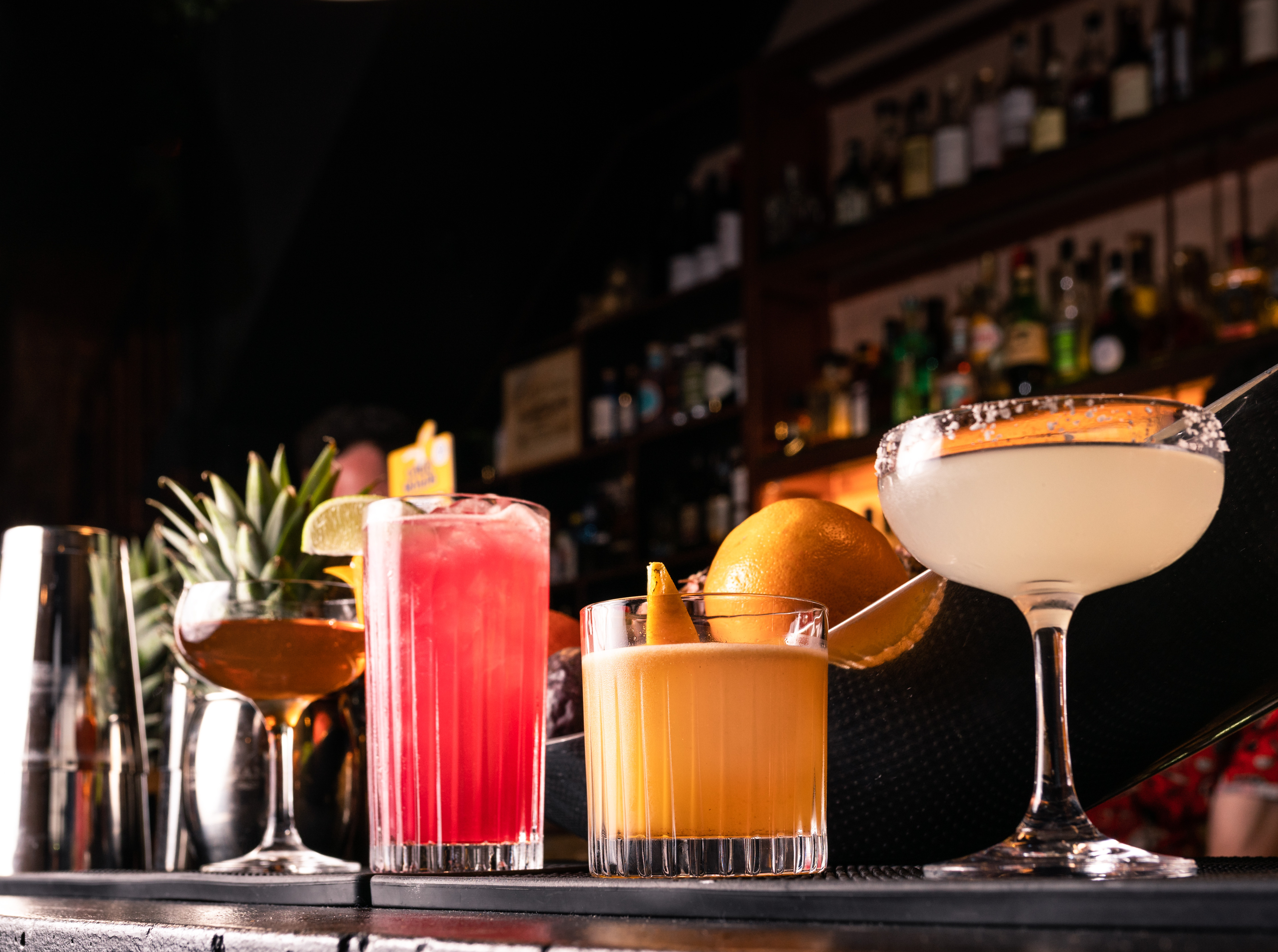 Cocktails lined up on the Sixty Smith bar