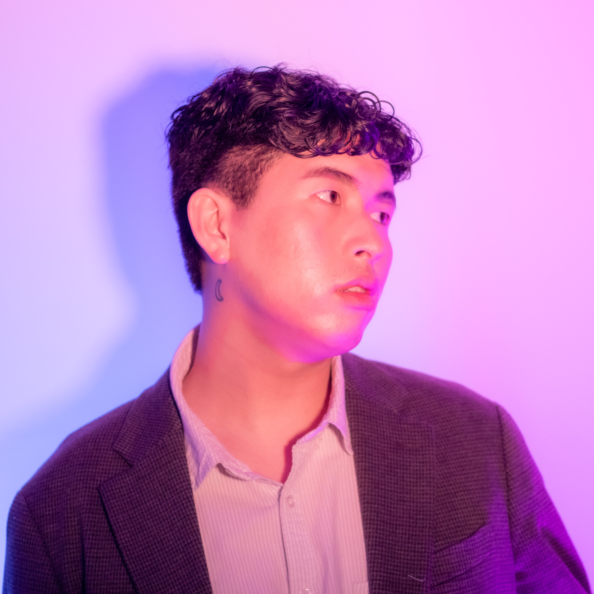 Headshot of Ken Shing looking a little concerned