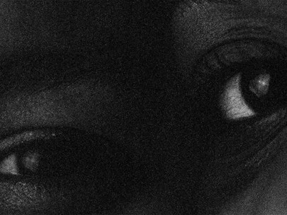 Black and white image of a pair of eyes, but blurred and taken from two different images