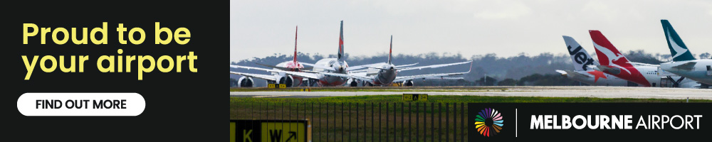 Advertising banner for Melbourne Airport with text Proud to be your airport