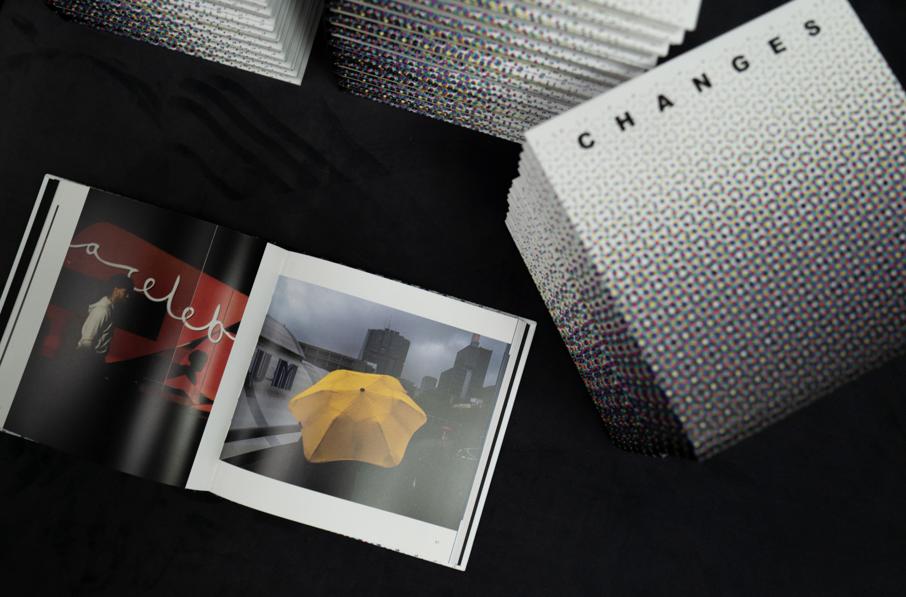 Piles of the book entitled "Changes", with one copy opened in the foreground