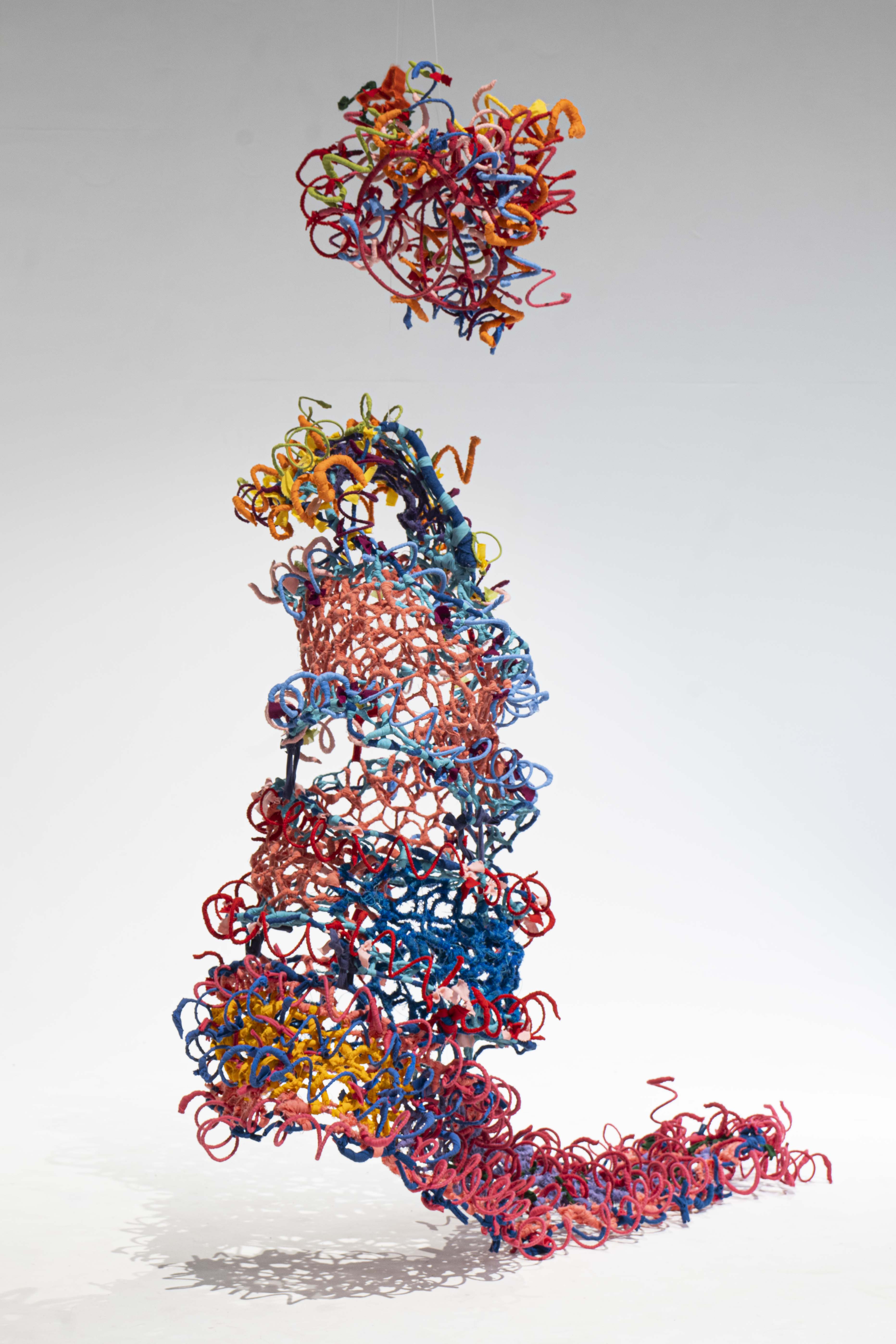 Sculpture made with a lot of coloured plastic string-like coils