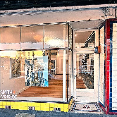 Facade of the Smith + Gertrude gallery showing some artworks inside the building